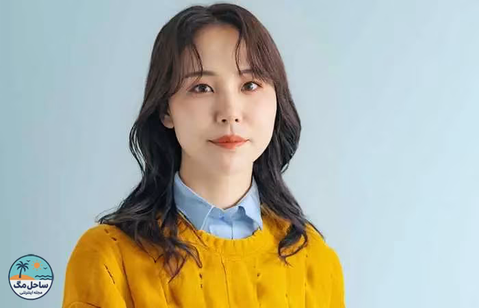 Asian woman with wispy bangs and mid-length layers