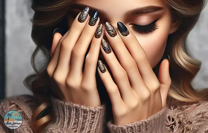 Intricate gold nail art on black nails