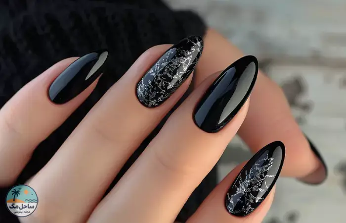 Black nail design on almond shaped nails