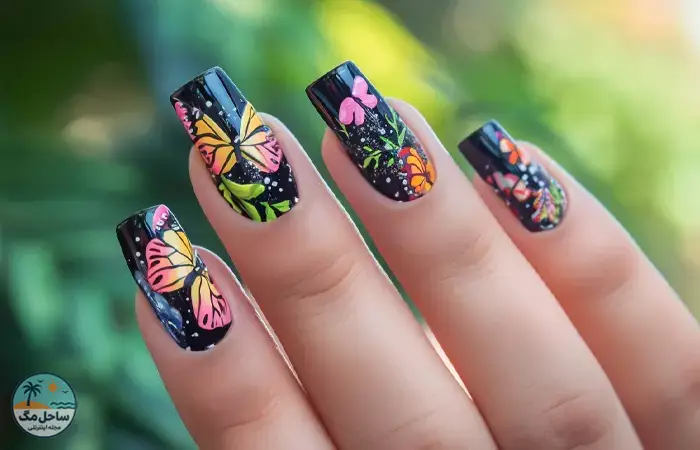 Black nail design with colorful butterflies
