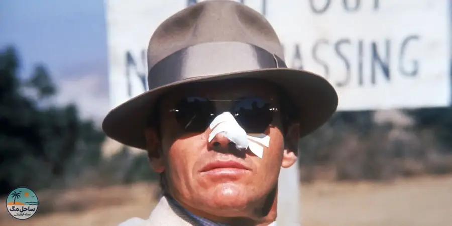 Jack Nicholson as Jake Gittes with a broken nose looking ahead in Chinatown.&nbsp;